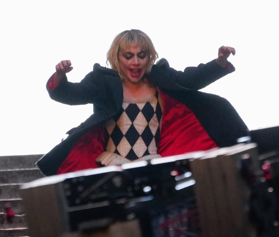 Joker: Folie à Deux (Joker 2) production photos show Lady Gaga and Joaquin Phoenix in full makeup on the first movie iconic concrete stairs.