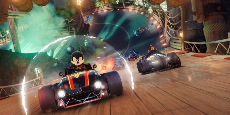 How Does Disney Speedstorm Compare to Mario Kart? Mickey Mouse leads Captain Jack Sparrow in a kart race.