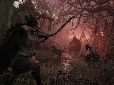 Archer preparing to shoot an arrow at enemies in Lords of the Fallen.