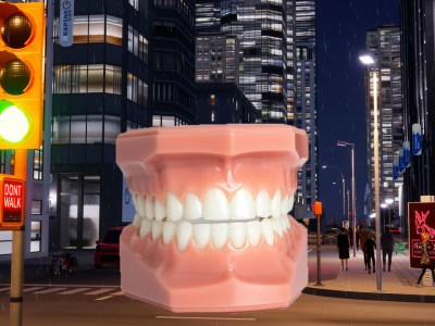 Cities: Skylines 2 with a big pair of false teeth in a street. Could teeth be slowing the game down?