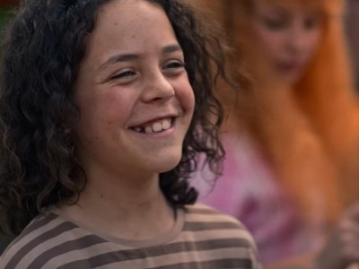 Eli Bell, played by Felix Cameron, smiles in a still from Boy Swallows Universe on Netflix.