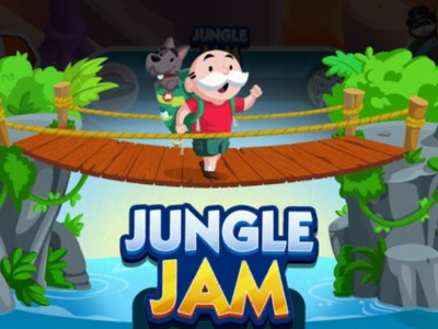 A header-sized image for the Jungle Jam event in Monopoly GO. The picture shows Rich Uncle Pennybags crossing a rickety wooden rope bridge over a river and the logo for the event. There's a dog on his back.