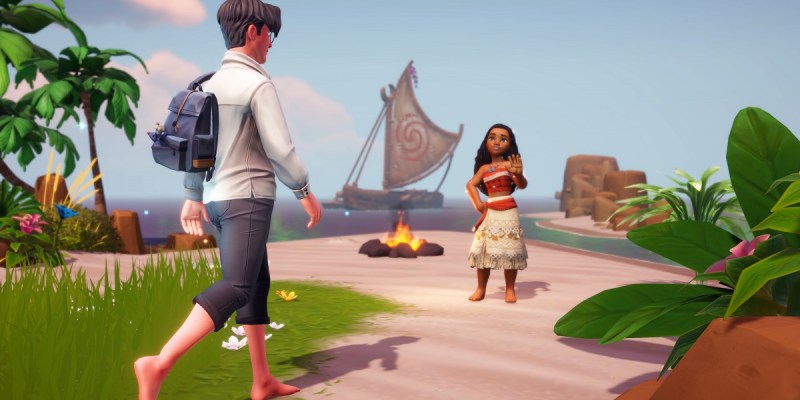 Image of character with a backpack walking toward Moana on a beach in Disney Dreamlight Valley.