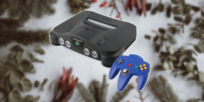 An image of the N64 against a festive background as part of an article on how it was a writer's favorite Christmas present.