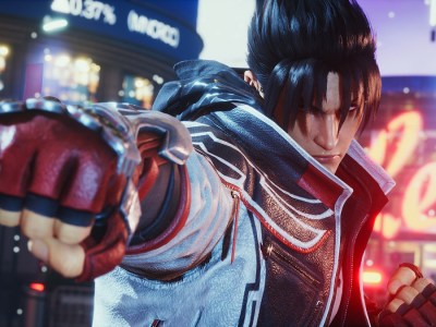 Image of Jin, a male fighter with red boxing gloves and black hair, preparing to battle in Tekken 8.