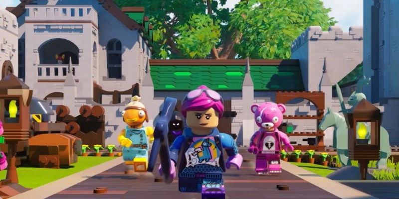 A Lego figure running along the road in Lego Fortnite. Other characters are around them.