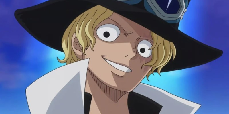 Sabo smiling in One Piece. This image is part of an article about who Sabo is in One Piece.
