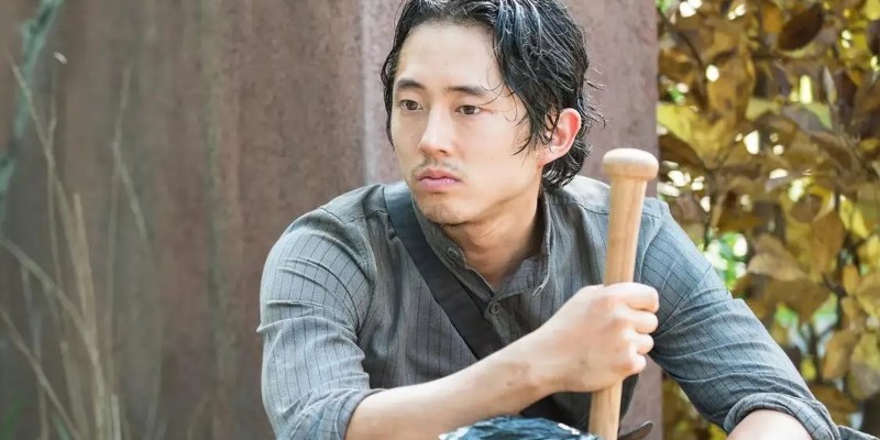 Steven Yeun in The Walking Dead. This image is part of an article about Steven Yeun still wanting to do a Marvel movie despite leaving Thunderbolts.