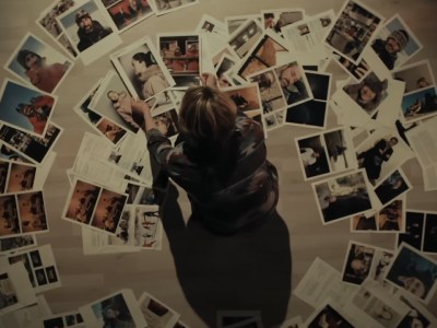 Liz Danvers with a spiral of photos in True Detective: Night Country