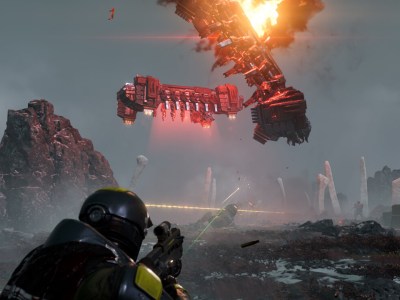 A man in a sci-fi set of armour shootingaway as two space-ships crash in front of him. This image is part of an article about how Helldivers 2 is fun but struggles to push beyond that.